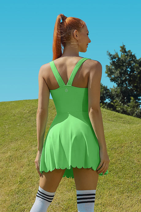 Vestido de tenis de mujer atlética verde con bolsillos